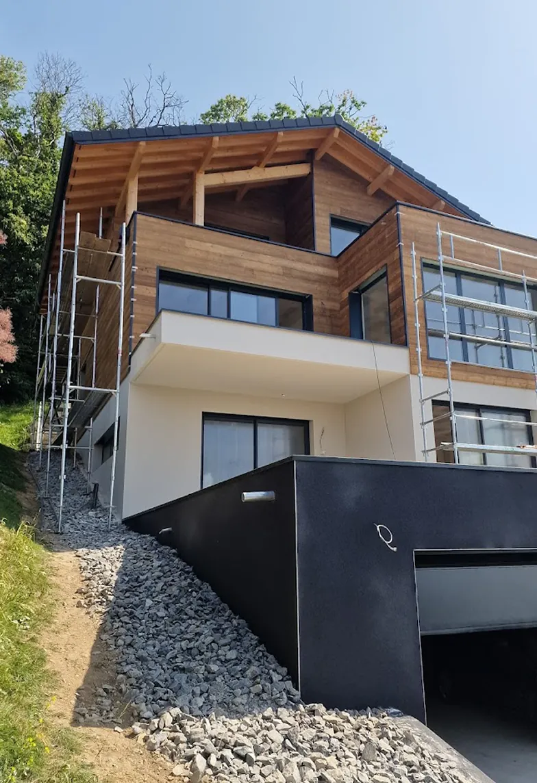 Charpente traditionnelle C2K — travail artisanal en Haute-Savoie